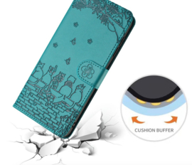 BookCover Hoes Etui voor iPhone 16  -  Turquoise  - Katten op muurtje - Reliëf