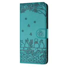 BookCover Hoes Etui voor Apple iPhone 16e  -  Turquoise  - Katten op muurtje - Reliëf