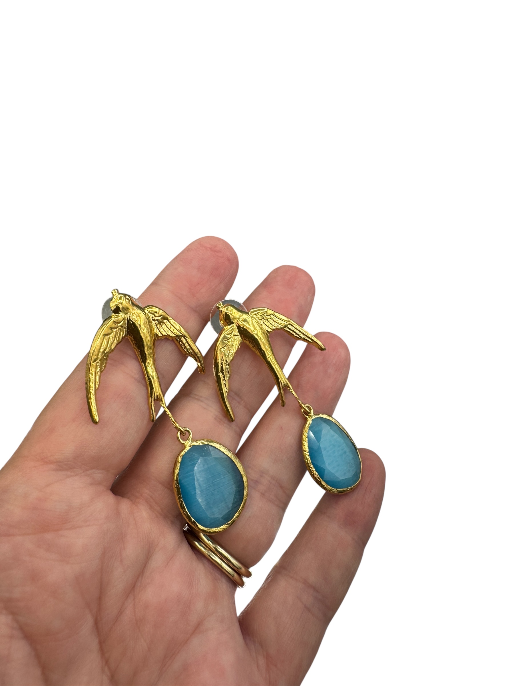 Zwaluws en aqua blue cateye