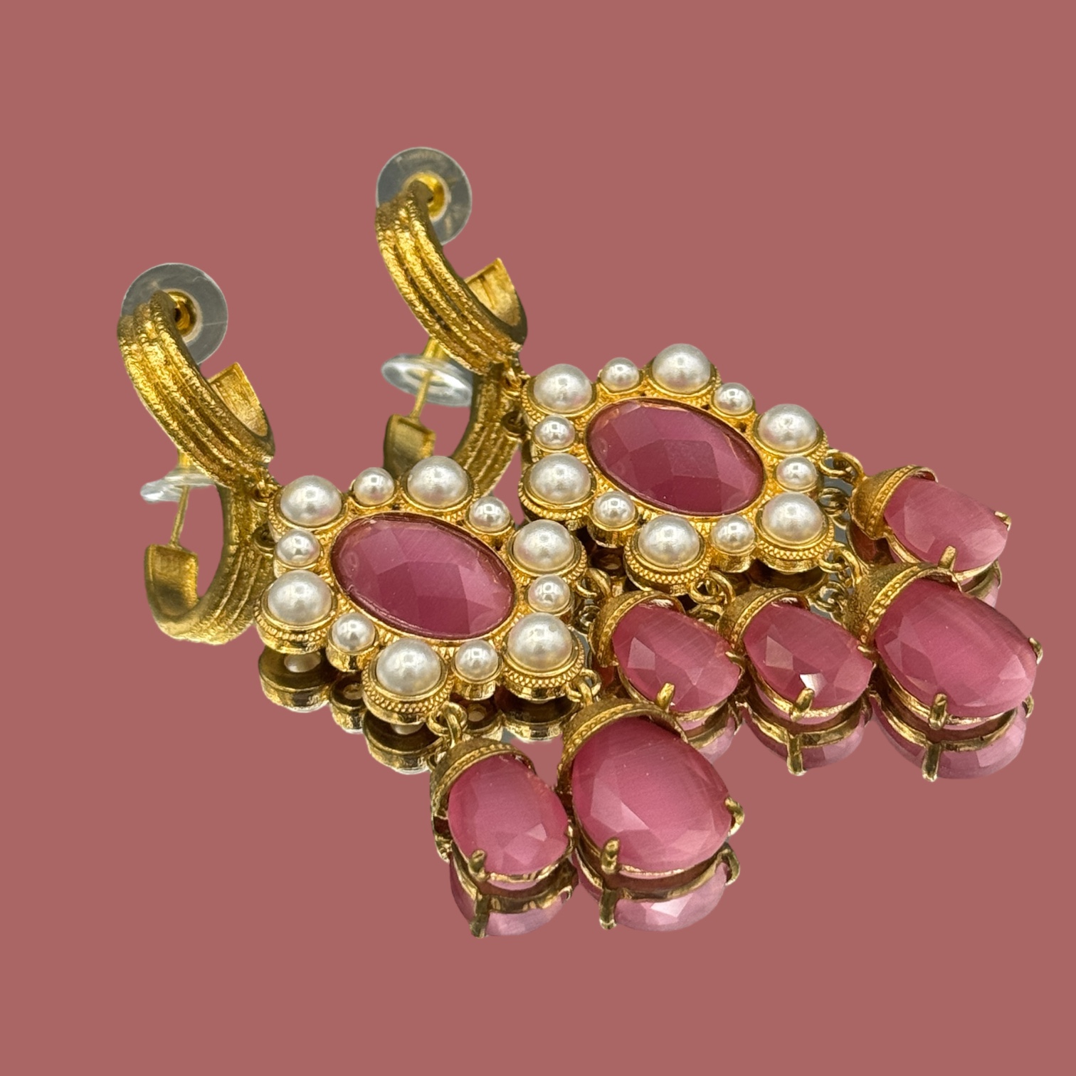 Artisan oorbellen roze cateye