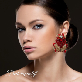 Couture oorbellen scarabee red