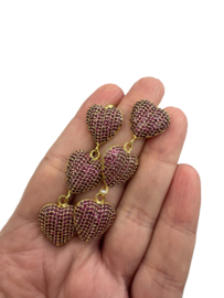 Donkerroze zirconia hartjes
