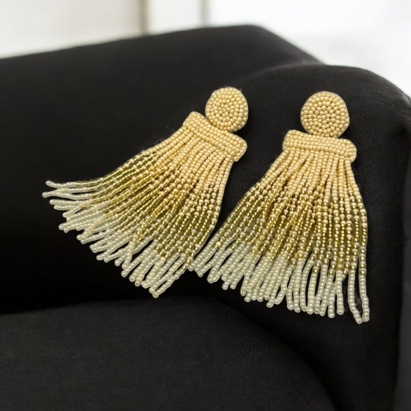 Pearly golden tassels