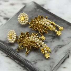 Pearly and golden earrings