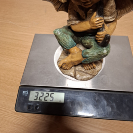 Zwaar Beeld van een kind onder een Paraplu - Umbrella Boy