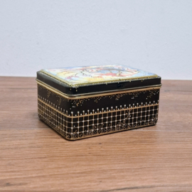Vintage decoratief blikje met een vogelmotief