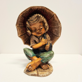 Zwaar Beeld van een kind onder een Paraplu - Umbrella Boy