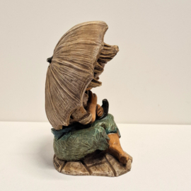 Zwaar Beeld van een kind onder een Paraplu - Umbrella Boy