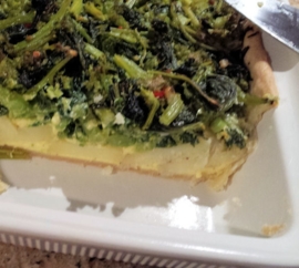 Quiche met cime di rapa, aardappel en ansjovis.