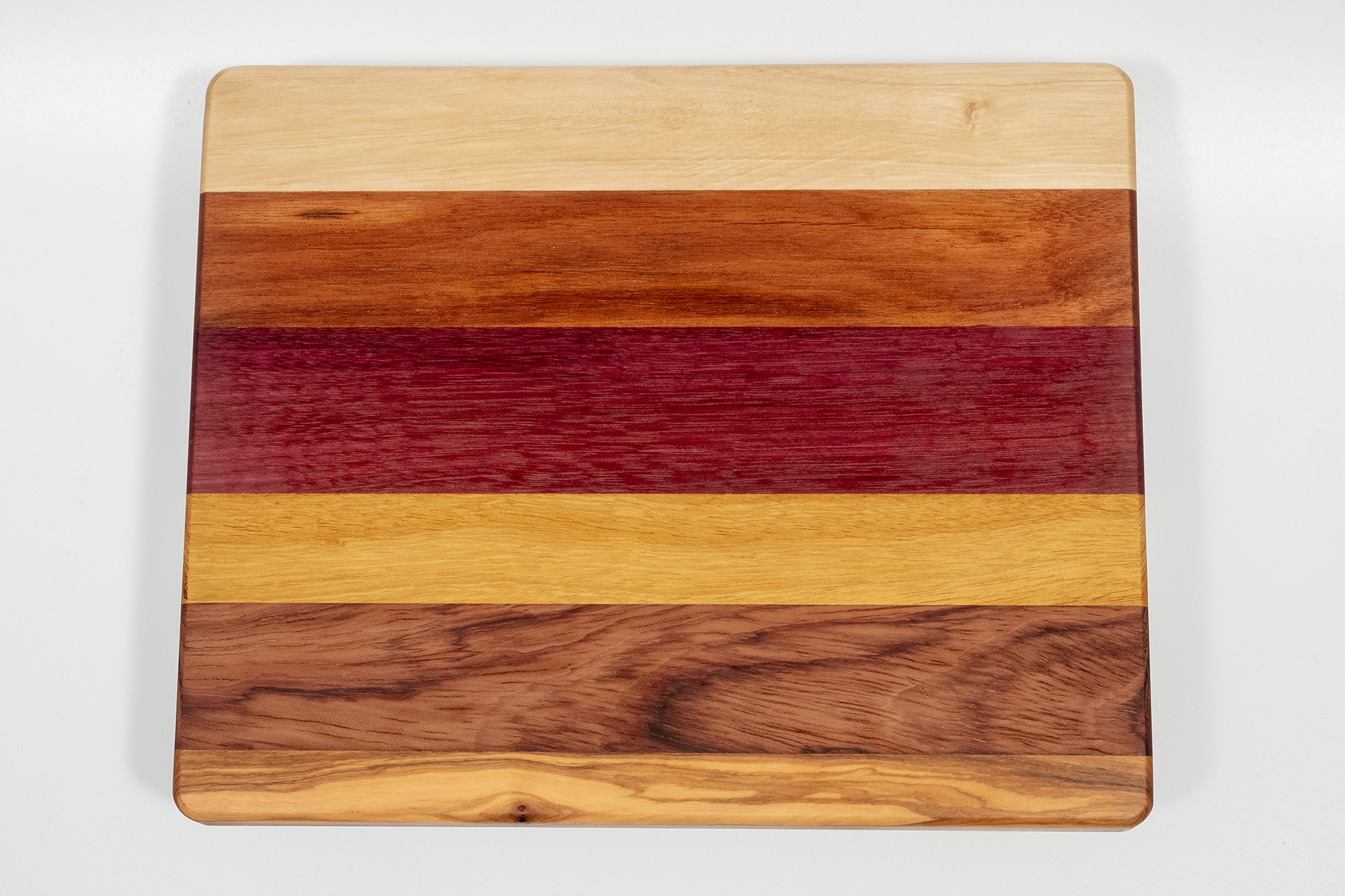 Unique cutting board (handmade), Olive, bubinga, iroko, purpleheart, Conçalo Alves, beech.