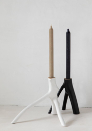 The triple wig candle holder