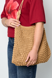 Tas Nora