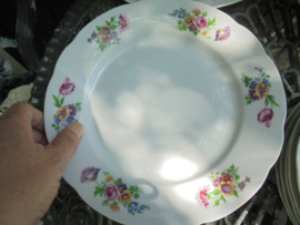 Diner bord met bloemboeketten / roze roos en tulp
