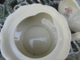 Theeservies MOSA met geel en blauwe bloem en eikeltjes knop