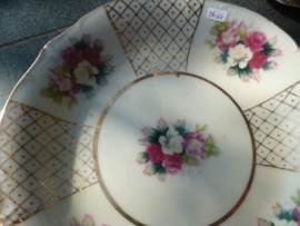 Petit foursetje met roze roosjes/bloemetjes en veel gouddecoratie