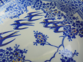 Petit fourset met zwaluwen en goud accenten in blauw / wit
