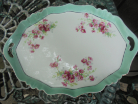 Ovaal wit porseleinen Dienblad met licht groene rand en roze roosjes / bloemetjes