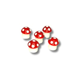 Miniatuur paddenstoelen rood met witte stippen