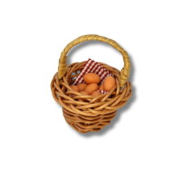 Miniatuur mandje met eieren