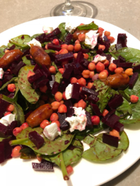 Red beet salat with warm chistorritas sausages