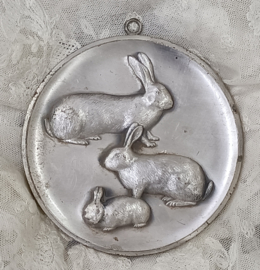 Oude medaille  konijnen