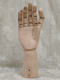 Oude houten hand