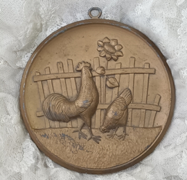 Oude medaille, kippen
