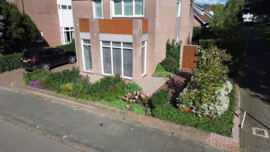 Tuinpoort cortenstaal met kantelblad motief
