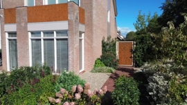 Tuinpoort cortenstaal met kantelblad motief