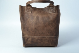 Bruine leren shopper met koeienvacht