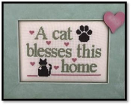 Kays Frames and Designs - A cat blesses this home