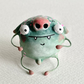 Mooki monster in een bol