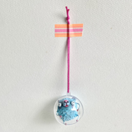 Quimble monster in een bol