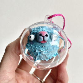 Quimble monster in een bol