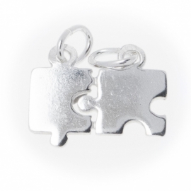 Zilver graveerplaatje puzzelstukjes 14 x 10,5 mm