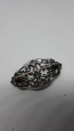 Kleine zilveren broche