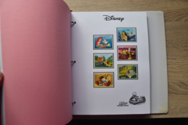 ALBUM MET VERSCHILLENDE DISNEY ZEGELS EN BLOKKEN