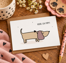 Wenskaart teckel - Hoera een puppy!
