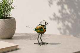 Vogel op voet, glas