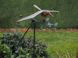 Tuinsteker vliegende vogel