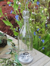 Theelichthouder glazen fles met Franse tekst