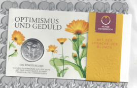 Oostenrijk 10 euromunt 2022 (42e) "De goudsbloem". Zilver in blister