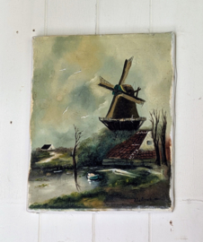 Oud schilderij op doek van een molen.