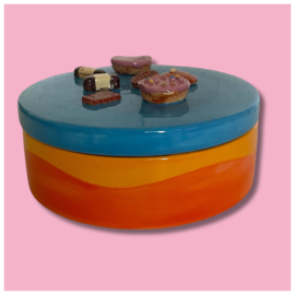 Koekjes koektrommel oranje gegolfd blauw deksel