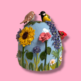 Urn met vogels en bloemen