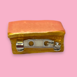 Broche tompouce