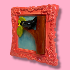 Schilderij van keramiek Merel