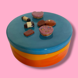 Koekjes koektrommel oranje gegolfd blauw deksel