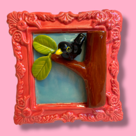 Schilderij van keramiek Merel