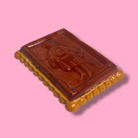 Scholiertje van keramiek
